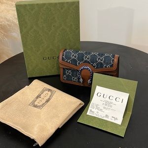 Brand new Dionysus super mini bag in denim.